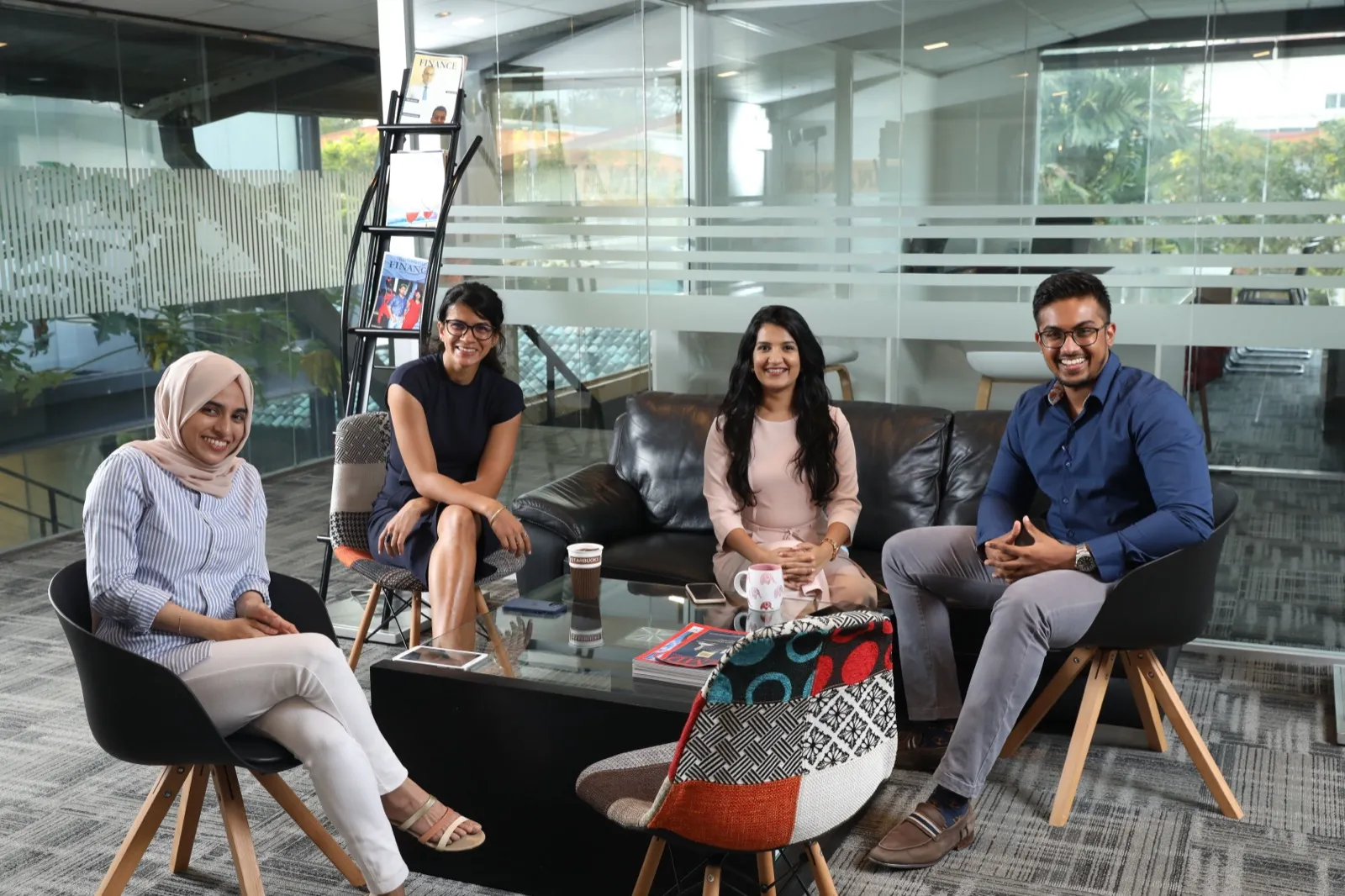 MAS early-talent participants meeting in an office lounge
